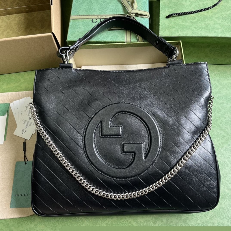 G*u*i top handle bags